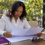 Woman reviewing Maryland contractor license documents