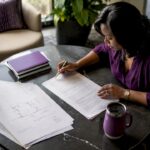 Project manager reviewing subcontractor agreements