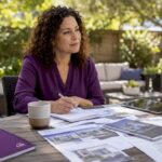 Homeowner reviewing remodeling options at kitchen table