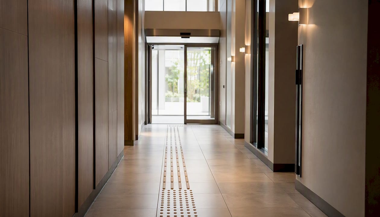 Clear accessible route in commercial building hallway