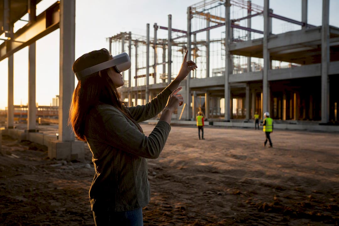 Architect using VR headset at building construction