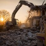 Residential demolition site with excavators in action