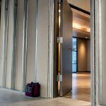 Rated commercial demising wall opening
