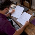 Contractor reviewing an insurance certificate