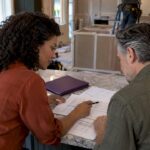 Homeowner and builder compare renovation pricing options