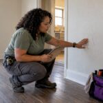 Contractor inspecting a vacant rental apartment